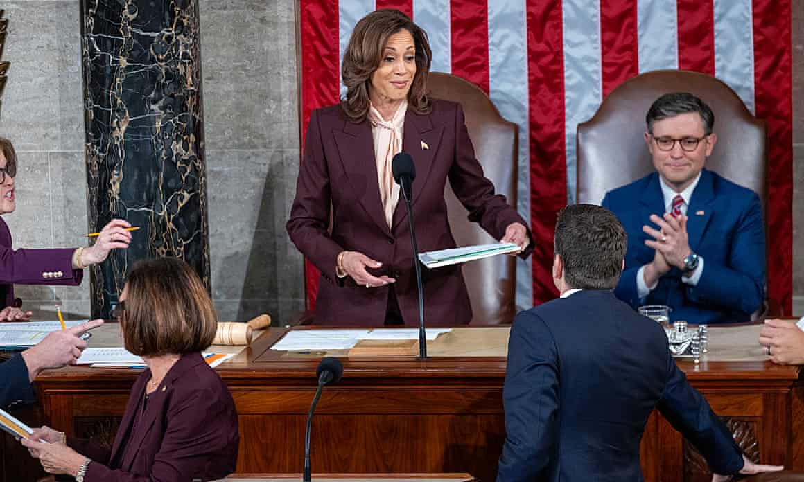 Kamala Harris (C) reacts as electoral votes are certified in President-elect Trump's election victory on the House floor of the US Capitol in Washington