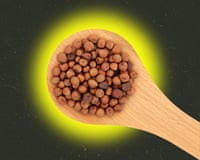 Wooden spoon with dried peas