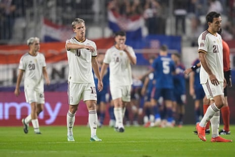 Spain's Dani Olmo (left) reacts after Croatia's Ivan Perisic scored.