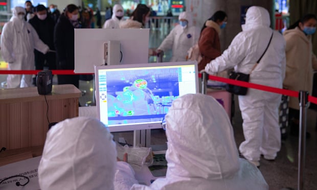 Medical infrared thermal imaging is used to check the temperature of rail passengers in Nanjing, where the World Indoor Championships were due to be held. 