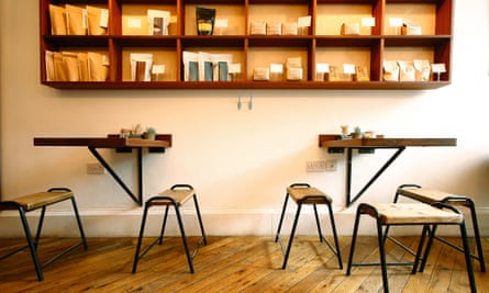 Wall-mounted tables and custom-made furniture and shelving make the most of limited space at Fortitude.