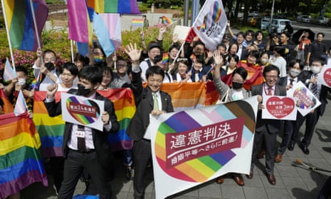 Lawyers and supporters celebrate after ruling at Nagoya district court in central Japan