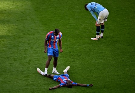 Marc Guehi and Ismaila Sarr of Crystal Palace celebrate victory at the final whistle.