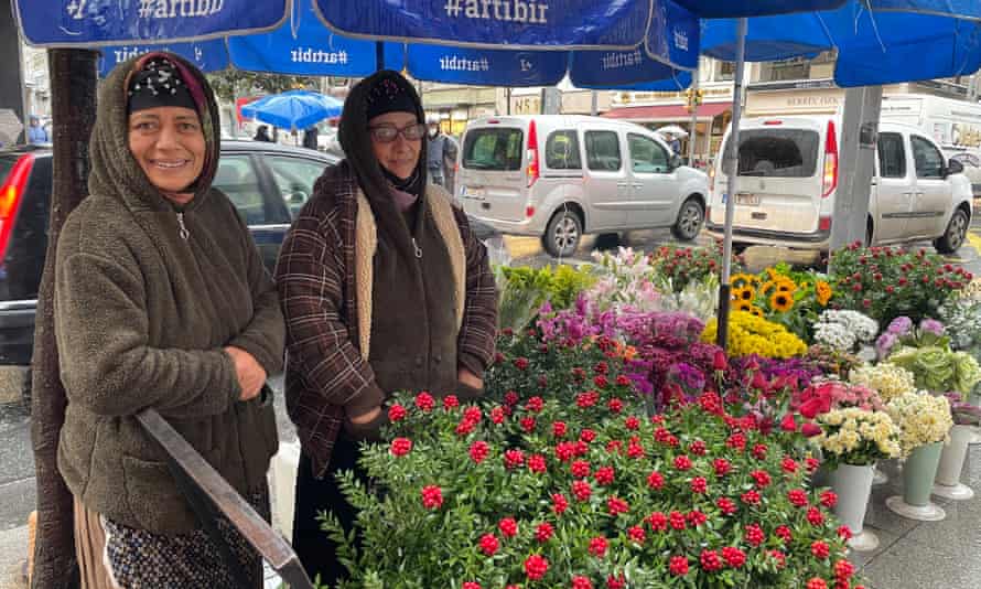 Two women selling kokina