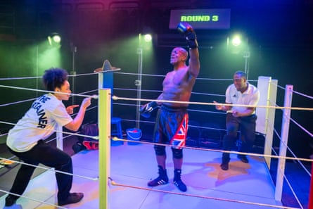 Mensah Bediako, center, as Vernon, with Amber James and Ashley D Gayle (Chorus) in On the Ropes.