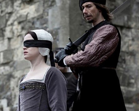 Claire Foy as Anne Boleyn and Philippe Spall as the Calais Executioner in Wolf Hall.