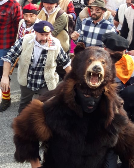 A man dressed as a bear.