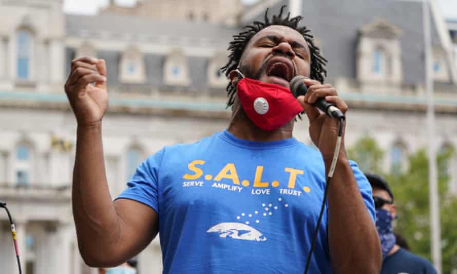 Jarell Johnson sings a song during a Juneteenth Celebration in Baltimore, Maryland.