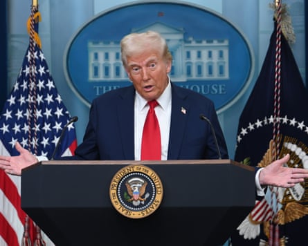 Trump at lectern with White House logo and US flag behind