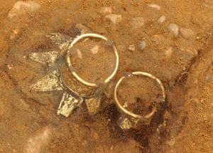 Drinking vessels in situ within the burial chamber.