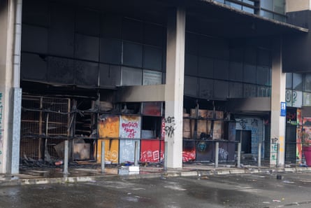 Shops that have been vandalised by rioters at Plexus shopping center in Noumea.