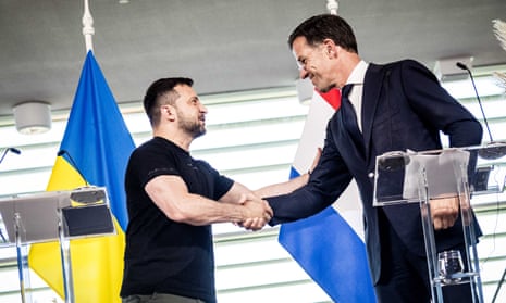 Zelenskiy, left, and Dutch prime minister Mark Rutte at Eindhoven airbase in the Netherlands on Sunday.