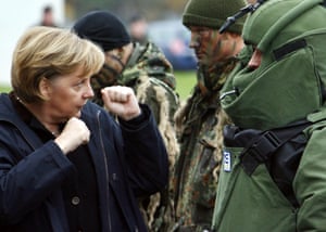 Merkel talks with a soldier of the Bundeswehr in Saxony-Anhalt in 2006