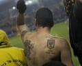 In this Tuesday, Jan. 29, 2013 file photo, Beitar Jerusalem F.C. soccer supporters watch a State Cup soccer match against Maccabi Umm al-Fahm F.C. at the Teddy Stadium in Jerusalem. Israeli police say they have arrested dozens of members of an extremist soccer fans' group. Police spokeswoman Luba Samri said on Tuesday, July 26, 2016 that 56 suspected members of the "La Familia" group of Beitar Jerusalem fans were arrested in an overnight raid. (AP Photo/Bernat Armangue, File)
