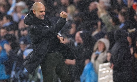 Manchester City manager Pep Guardiola celebrates his team’s second goal.