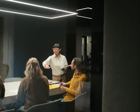 Woman engaging with coworkers in a productive meeting