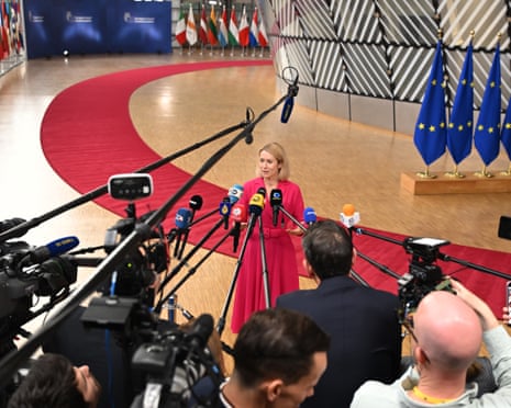 European Union foreign policy chief Kaja Kallas speaks with the media as she arrives for the EU summit at the European Council building in Brussels.