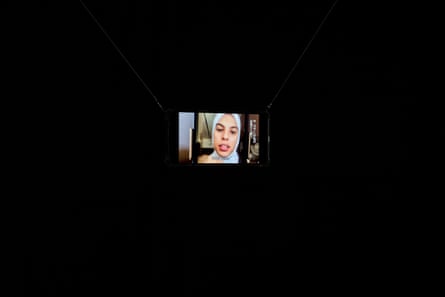 Video recording of the photographer Fatma Hassona displayed on an iPhone in The Eye of Gaza exhibition in Hachiku-an, Kyoto