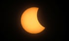 Partial solar eclipse reaches Texas ahead of total eclipse across US, Mexico and Canada – live