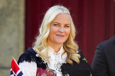 Norway’s crown princess, Mette-Marit, watches a parade on the occasion of Norway’s Constitution Day, at Skaugum, their official residence, near Oslo