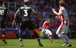 Xherdan Shaqiri curls in the free-kick.