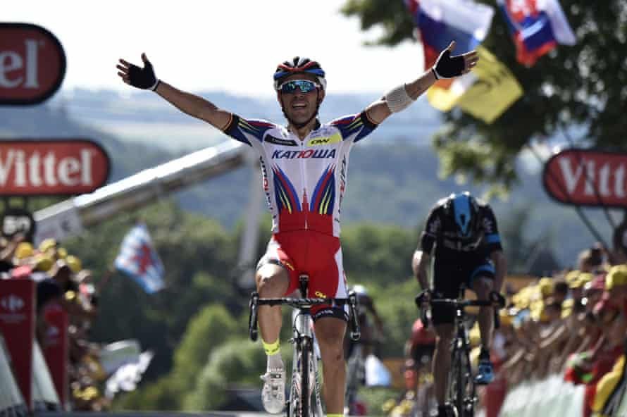 Spain’s Joaquim Rodriguez celebrates as he crosses the line at the end of the 159.5 km third stage.