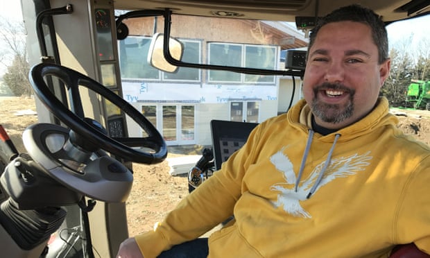 Farmer and technician Kyle Schwarting, from Ceresco, Nebraska, in the cab of his Case IH tractor.