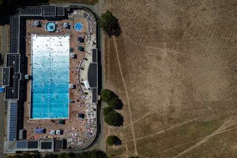 An aerial view shows swimmers using Parliament Hill Fields Lido in London.