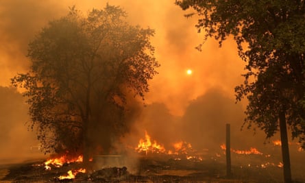 Debris piles burn as the LNU Lightning Complex fire burns through the area on 19 August 2020 in Fairfield, California. 