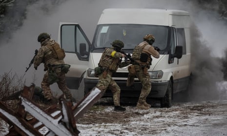 Ukrainian servicemen attend a joint drill of armed forces near the border with Belarus.