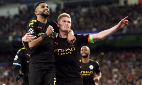 Kevin De Bruyne celebrates with Riyad Mahrez after scoring Manchester City’s second and decisive goal at Real Madrid.