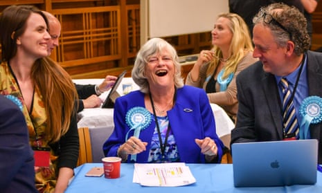 Ann Widdecombe, centre, laughs as EU election results come in at the count in Poole