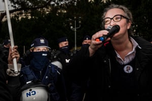 Marta Lempart calls for the liberalisation of abortion, establishment of sex education classes and universal access to contraception during a rally in front of parliament in Warsaw on 27 October.