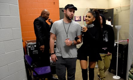 Braun backstage with Ariana Grande.