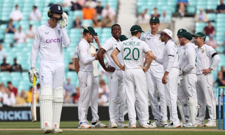South Africa's Kagiso Rabada (centre) celebrates with teammates after the dismissal of England batsman Alex Lees.
