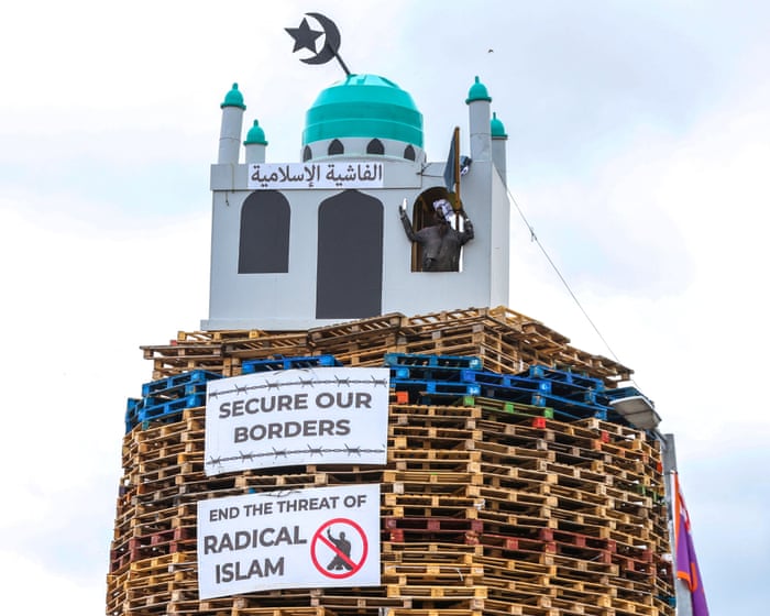 Mosque effigy on loyalist bonfire in Northern Ireland condemned as ‘vile’