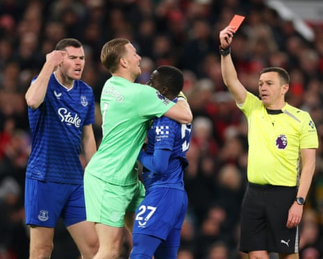 Gueye of Everton is shown a red card.