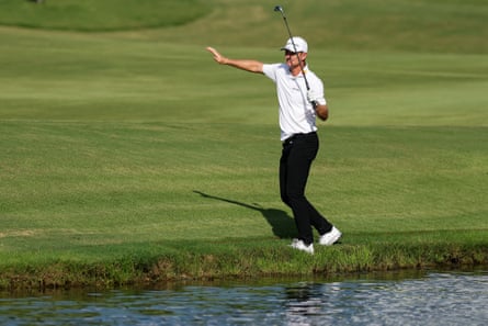 Justin Rose pulls off a fine approach from the edge of the water