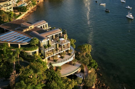 An aerial view of a four-story home from the air overlooking Sydney harbour