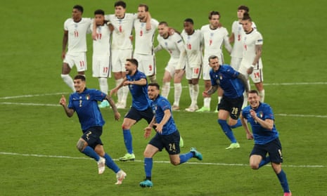 England players can only look on as Italy celebrate their penalty shootout win at Wembley. 