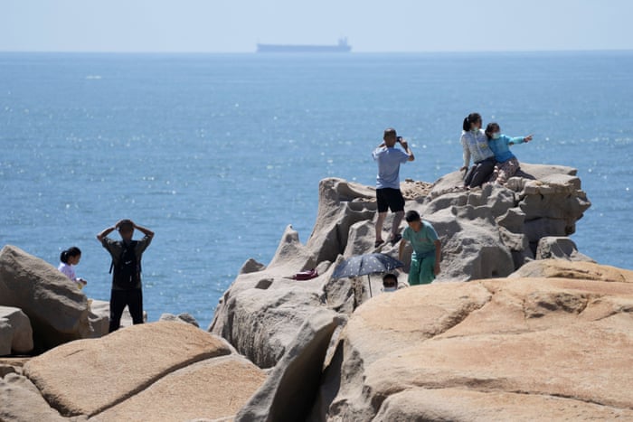 Tourists gathered on Friday to try to catch a glimpse of any military aircraft.