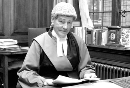 Lord Widgery, the lord chief justice, pictured in 1972 in his room at the Old Bailey as he looks through his report on the Bloody Sunday shootings.