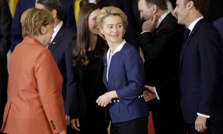 Merkel and Macron flank the European commission president, Ursula von der Leyen, at a summit in Brussels