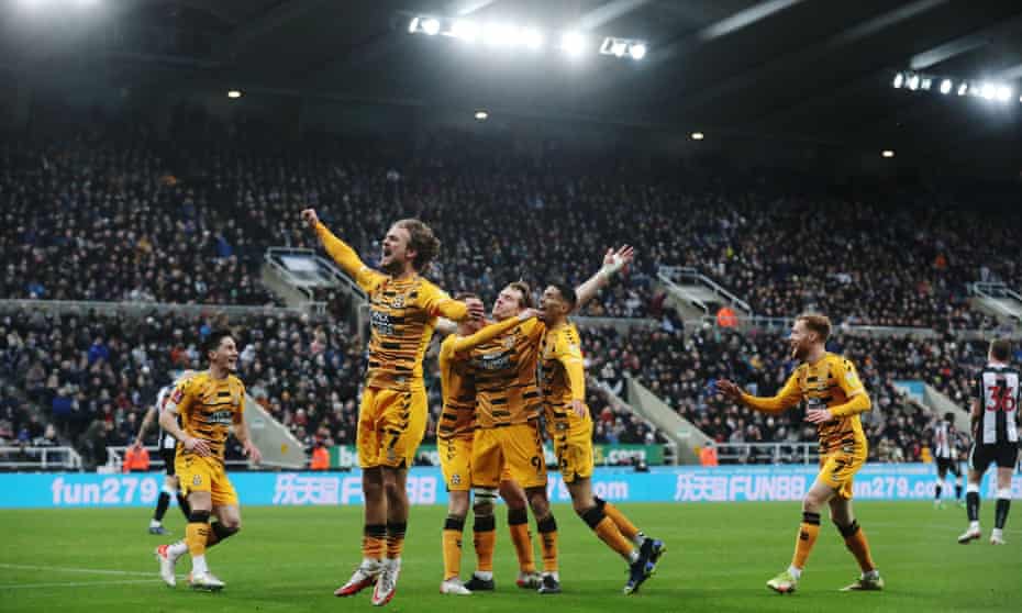 Cambridge United's Joe Ironside celebrates with teammates after opening the scoring.