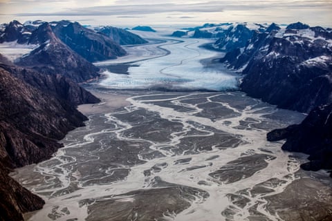 an aerial view of a melting glacier