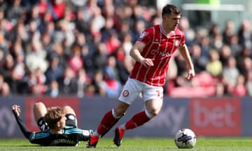 Bristol City’s Jason Knight surges forward with the ball after evading a tackle from Kiernan Dewsbury-Hall of Leicester City.