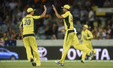 Pat Cummins (left) and Mitchell Starc high five during Australia’s win over New Zealand in Canberra this week.