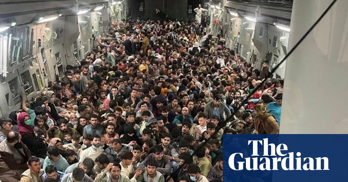 Afghanistan: striking image appears to show 640 people fleeing Kabul in packed US military plane