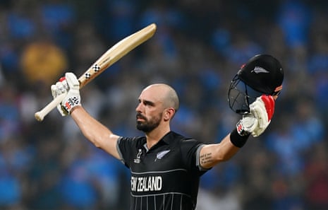 Daryl Mitchell celebrates after scoring a century
