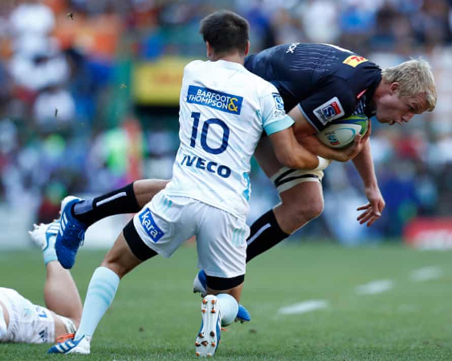 Otere Black of the Blues (left) tackles Pieter-Steph du Toit of the Stormers during the Super Rugby match between the Stormers of South Africa and the Blues of New Zealand at Newlands Stadium in Cape Town, South Africa, 29 February 2020.